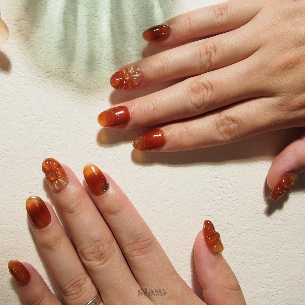 Amber Blossom Handmade Press-on Nails on hand by Claw Creature