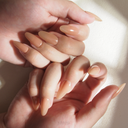 Nude Elegance Gloss Variant Handmade Press-on Nails display on hand by Claw Creature